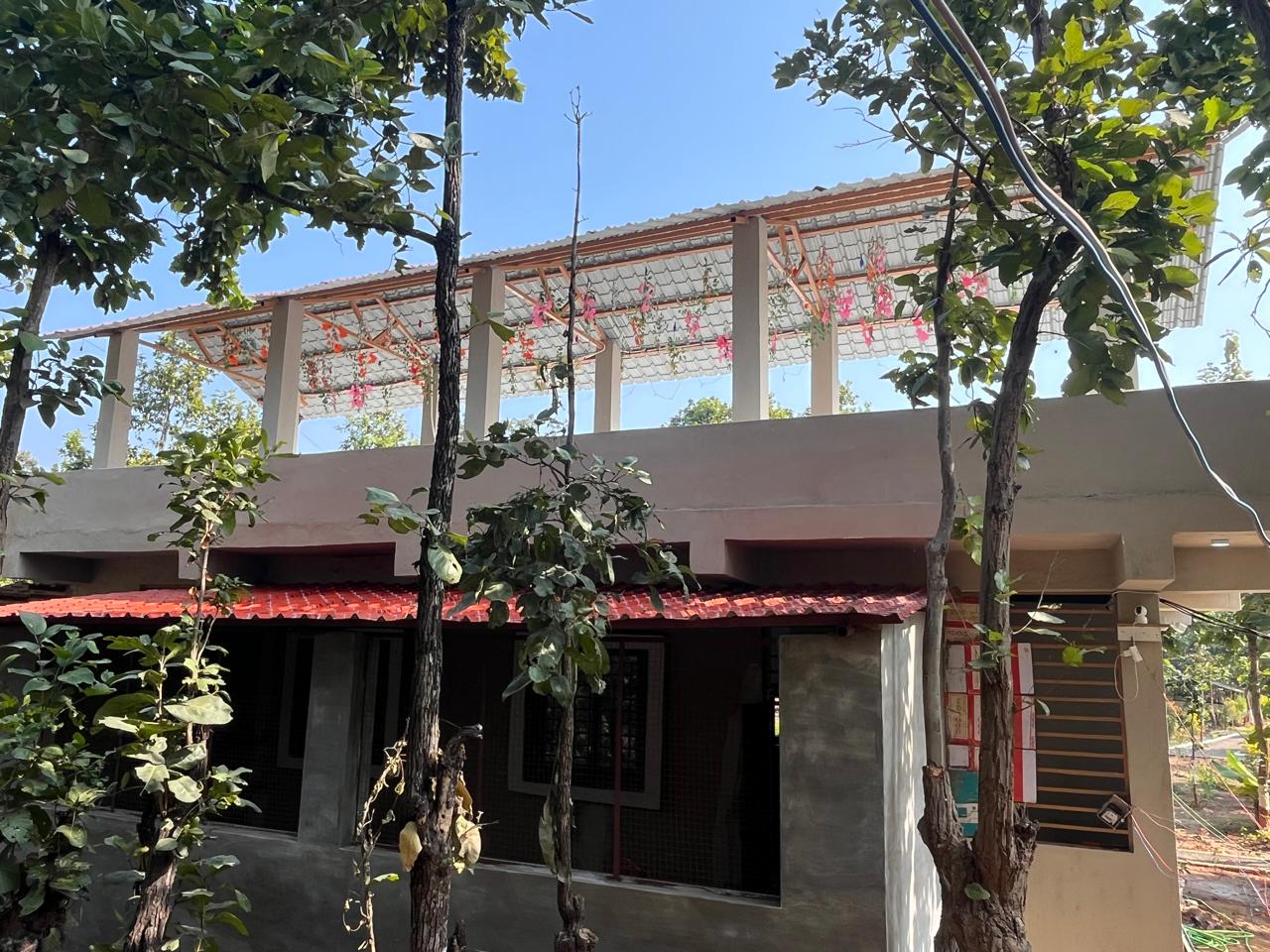 Luxury resort pool with palm trees at sunset